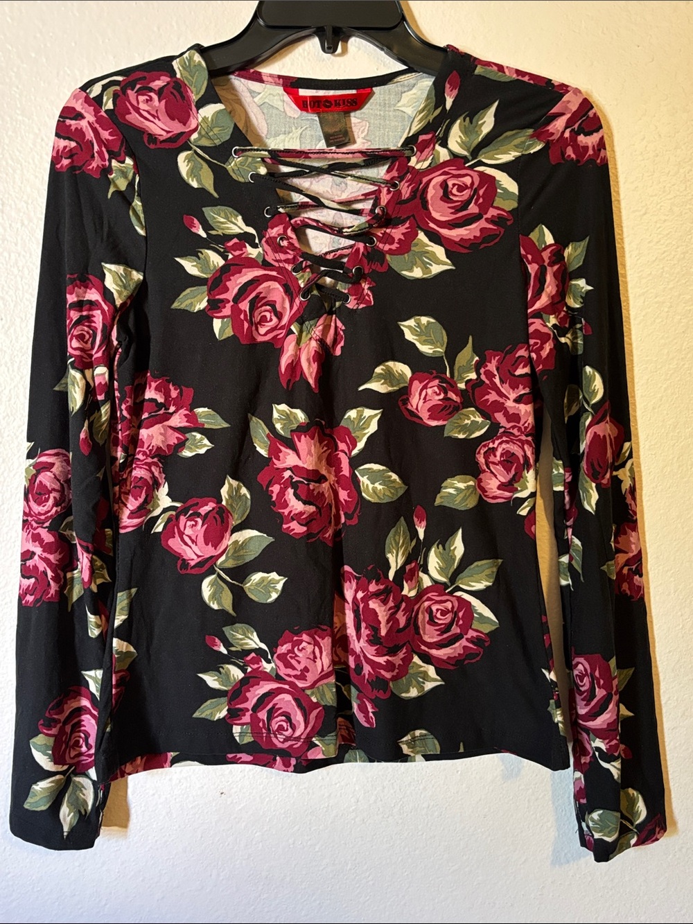 Woman’s Black Long Sleeve Top With Pink Roses and Lace Up Detail, size L